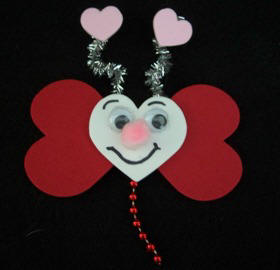 Make a butterfly from craft foam hearts with free instructions from Craft Elf